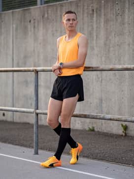 Evospeed Future 6 Track  Field Sprinting Spikes – Lightweight split running shorts in matte black paired with a neon performance tank top to maximize mobility and visibility during sprints.