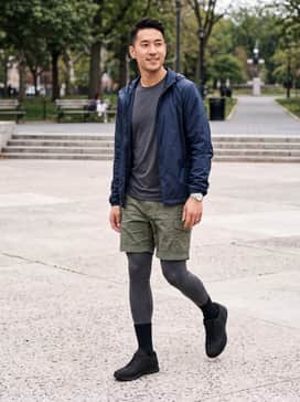 Pair these shoes with olive green ripstop cargo shorts, a charcoal grey performance moisture-wicking t-shirt, and a lightweight navy windbreaker for a functional trail-ready look.
