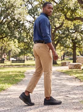 Combine with tan cotton chinos, a navy blue linen button-down shirt with rolled-up sleeves, and a simple black canvas belt for a smart-casual outdoor brunch vibe.