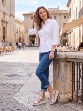 Flowt Wedge Lx – Straight-leg cuffed denim jeans with a crisp white button-down shirt for a polished yet relaxed weekend ensemble.