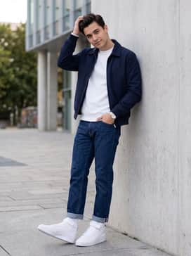 Forum Mid Shoes – Straight-leg raw indigo denim with a crisp white crewneck sweatshirt and a navy harrington jacket for a refined, minimalist streetwear vibe.