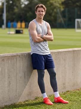 A high-intensity practice ensemble with a breathable silver mesh tank top and deep navy compression shorts for maximum mobility and style.