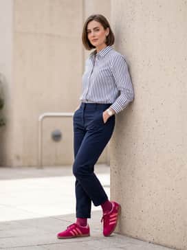 Match with relaxed-fit navy blue chinos and a tucked-in striped button-down shirt for a smart-casual ensemble with a pop of personality.