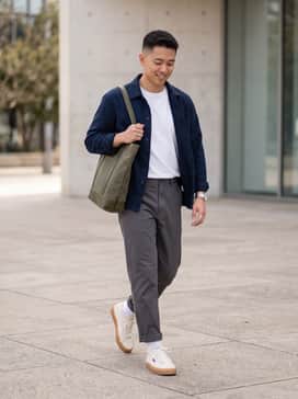 Govy – Pair with charcoal grey relaxed-fit chinos, a tucked-in white organic cotton tee, and an unbuttoned navy overshirt for a clean, layered look.