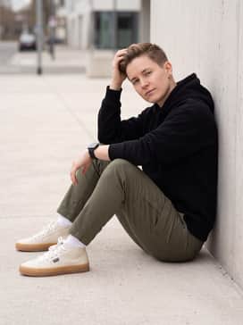 Govy – Wear with olive green tapered cargo pants and a black oversized hoodie for a streetwear-inspired ensemble that emphasizes the gum sole contrast.