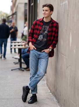 Relaxed Weekend: Wear with light-wash distressed straight-leg jeans, a vintage-style graphic t-shirt, and an open flannel shirt in forest green or red check.