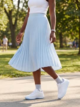 Gv Special Boss – For a feminine touch, wear with a pleated midi skirt in a pastel shade and a fitted white ribbed tank top to contrast the sporty silhouette.