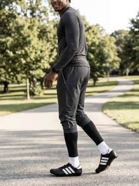 Heritage Road Cycling Shoes – Tapered joggers with reflective details and a fitted long-sleeve base layer, ideal for early morning training rides in cool weather.