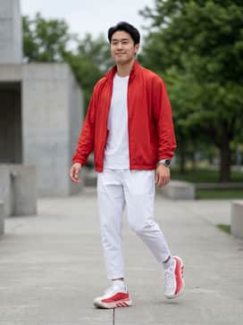 A matching red and white performance tracksuit with a moisture-wicking compression shirt underneath for a cohesive athletic look.