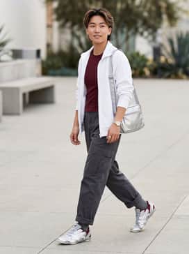 Hypersync – Baggy charcoal cargo pants paired with a fitted burgundy baby tee and a silver metallic shoulder bag to echo the shoe's futuristic hardware.