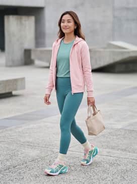 Inverse Mosaic Womens Sneakers – High-waisted teal leggings with a matching sports bra and an oversized pastel pink zip-up hoodie for a cohesive gym-to-street look.
