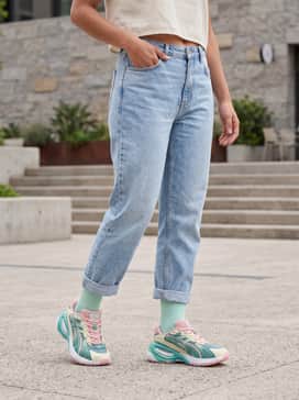 Inverse Mosaic Womens Sneakers – Light-wash boyfriend jeans cuffed at the ankle, paired with a white cropped baby tee and a mint green baseball cap for a relaxed weekend vibe.