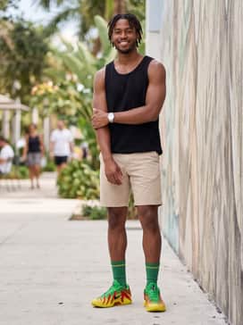 Ja 3 – A summer vibe with neutral beige chino shorts and a simple black tank top to let the vibrant shoe colors stand out.