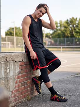 Black performance basketball shorts with a matching team jersey or a breathable compression top for a high-intensity on-court look.