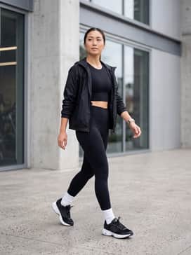 Pair these sneakers with high-waisted compression leggings in deep onyx and a seamless white performance crop top. Add a lightweight black windbreaker for a sleek, functional gym-to-street look.