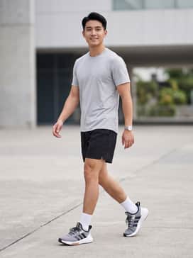 Pair these sneakers with black moisture-wicking running shorts, a light grey performance tee, and white quarter-length athletic socks for a cohesive gym-ready look.