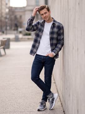 Combine these with slim-fit dark indigo denim, a crisp white crew-neck t-shirt, and an open flannel shirt in grey or navy for a versatile weekend ensemble.
