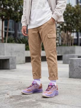 Kd18 Bad – Pair with tapered tan cargo pants and an oversized white graphic tee to highlight the earthy tones and purple layers.