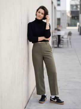 Olive green wide-leg trousers and a black cropped turtleneck sweater to highlight the gum sole and black leather upper.