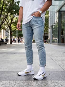 Lebron Tr 1 – Style with light-wash distressed slim-fit jeans and an oversized white graphic t-shirt to lean into a premium streetwear aesthetic.