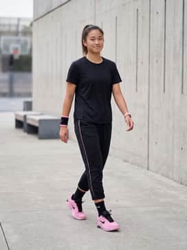 Lebron Witness 9 – A black and pink performance basketball kit with a breathable jersey and mesh shorts for a cohesive court appearance.