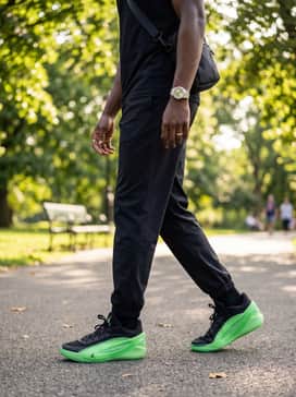 Luka 5 Venom – A clean athleisure style pairing slim-fit charcoal grey joggers with a boxy black t-shirt and a sleek black crossbody bag for a casual yet intentional urban look.