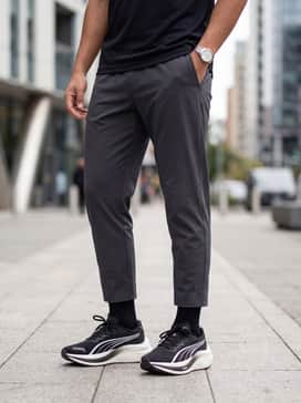 Athletic-fit slim jeans in a dark indigo wash, a crisp white oversized cotton t-shirt, and a black denim jacket for a contemporary casual weekend vibe.