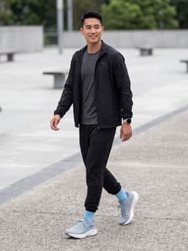 Magnify Nitro 3 – Performance Athletics: Pair with charcoal moisture-wicking compression tights, black lightweight running shorts, and a light blue technical tee to highlight the shoe's accents.