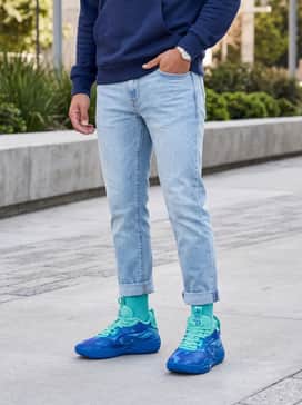 Combine with light-wash stacked denim jeans and a simple navy blue hoodie to let the vibrant shoes be the focal point of a relaxed weekend outfit.