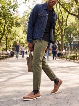 Mens American Classics Hampton Loafers – Style with olive green tapered fatigue pants, a high-quality black t-shirt, and an unbuttoned denim jacket for a grounded, everyday street-style aesthetic.