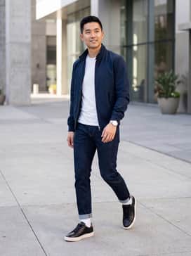 Pair these sneakers with slim-fit dark indigo denim, a tucked-in white pima cotton t-shirt, and a navy blue harrington jacket for a timeless, clean weekend look.