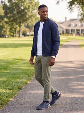 Mens Grandpr Allday Golf Shoes – Lightweight olive chinos with a crisp white t-shirt and a navy bomber jacket for a refined weekend brunch ensemble.