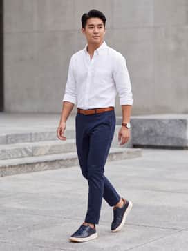 Pair with slim-fit navy chinos, a crisp white button-down shirt, and a cognac leather belt to echo the shoe's heel accent.