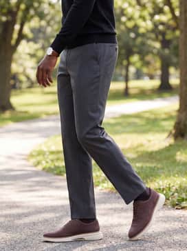 Mens Riginalgrand Cityspectre Wholecut Oxfords – Charcoal grey dress slacks combined with a sleek black turtleneck and a minimalist leather watch for a sophisticated evening out.