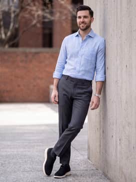 Wear with charcoal grey dress trousers and a light blue dress shirt with rolled-up sleeves for a relaxed yet professional vibe.