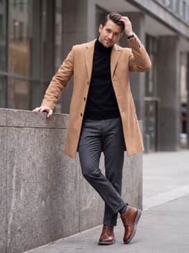 Charcoal wool trousers and a black turtleneck topped with a tailored camel overcoat to emphasize the boot's sleek profile in colder weather.