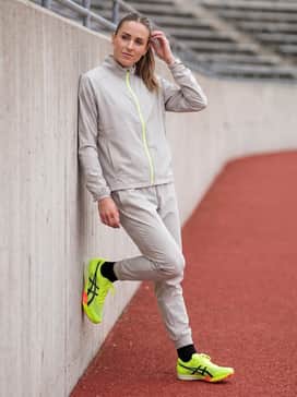 Metaspeed Ld 2 Paris – A technical team windbreaker and tapered athletic joggers for warm-up drills on the track.