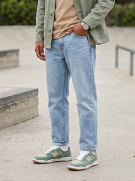 Combine with light-wash straight-leg jeans, a tucked-in tan mock-neck shirt, and an open sage green chore coat to play off the shoe's color palette.