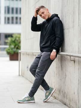 Wear with charcoal grey tech-fleece joggers and a sleek black windbreaker for a functional, athletic-leaning streetwear aesthetic.