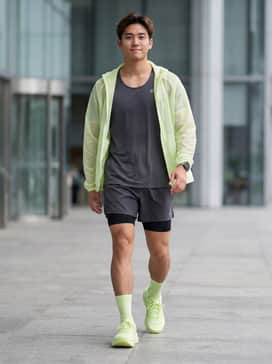 Performance Athletics: Pair these vibrant sneakers with black compression tights under charcoal running shorts and a matching light gray moisture-wicking singlet for a professional athletic look.
