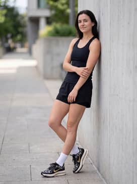 Pegasus Premium – Black 5-inch running shorts paired with a breathable white racerback jersey to complement the light tones in the shoe's midsole and pattern.