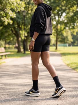 Pegasus Premium – An oversized black athletic hoodie and matching biker shorts for a modern, streetwear-inspired post-workout aesthetic.