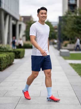 Phantom 6 High Pro – A coordinated professional team kit featuring a white slim-fit jersey and navy blue technical shorts to make the crimson pop.