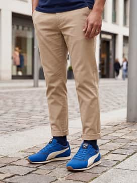 Porsche Legacy St Miler Mens Sneakers – Style with khaki chinos and a light blue button-down oxford shirt to lean into a smart-casual aesthetic perfect for a relaxed office or weekend brunch.