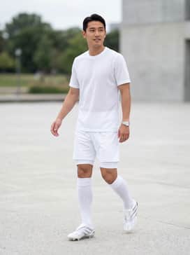Predator Precision Firm Ground Cleats – A crisp, monochromatic white match-day kit with high-performance compression socks and a breathable mesh jersey for a professional, unified look.