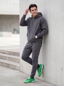 Predator Sala Shoes – Charcoal grey tapered joggers and a matching oversized fleece hoodie for a coordinated and high-impact loungewear look.