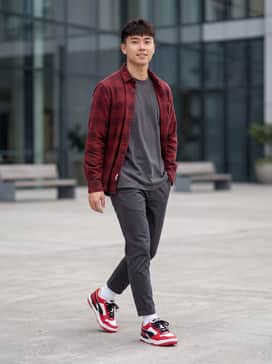 Pair with medium-wash straight-leg jeans, a crisp white crewneck t-shirt, and an unbuttoned red flannel shirt for a classic, coordinated Americana look.