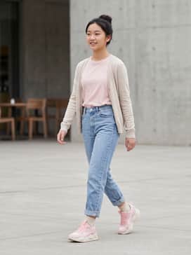 Rsx Ornate – High-waisted light-wash mom jeans paired with a cropped white rib-knit baby tee and a delicate gold necklace.