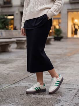 Sambae Shoes – Style with a black midi-length slip dress and an oversized cream-colored knit sweater layered over it for a soft, feminine look with a sporty edge.