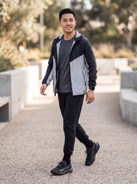 Seasons Voyage Nitro 3 Mens Running Shoes – A performance-focused ensemble featuring black moisture-wicking tapered joggers, a charcoal grey technical tee, and a lightweight reflective windbreaker.